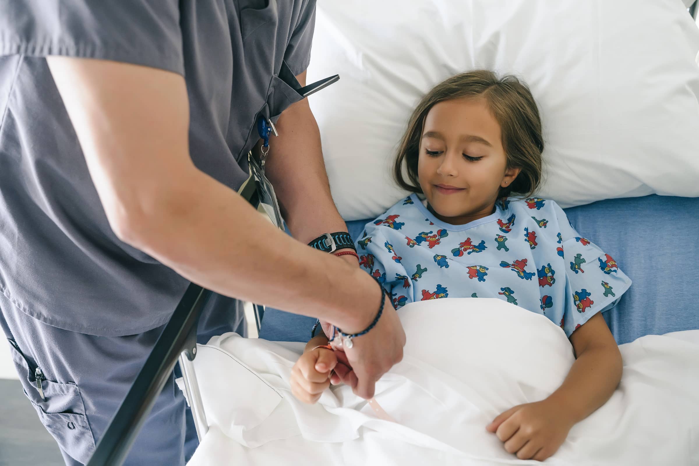 Girl in hospital bed