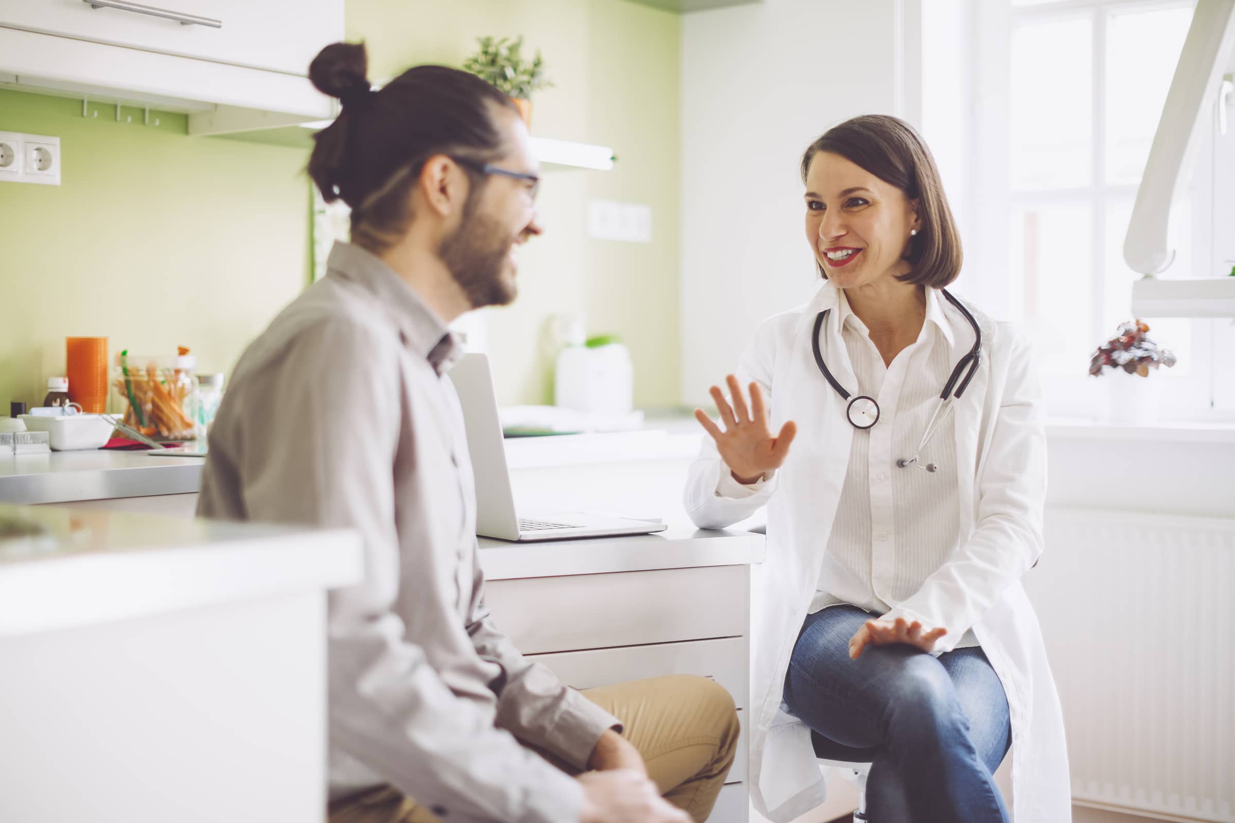 Man talking to doctor